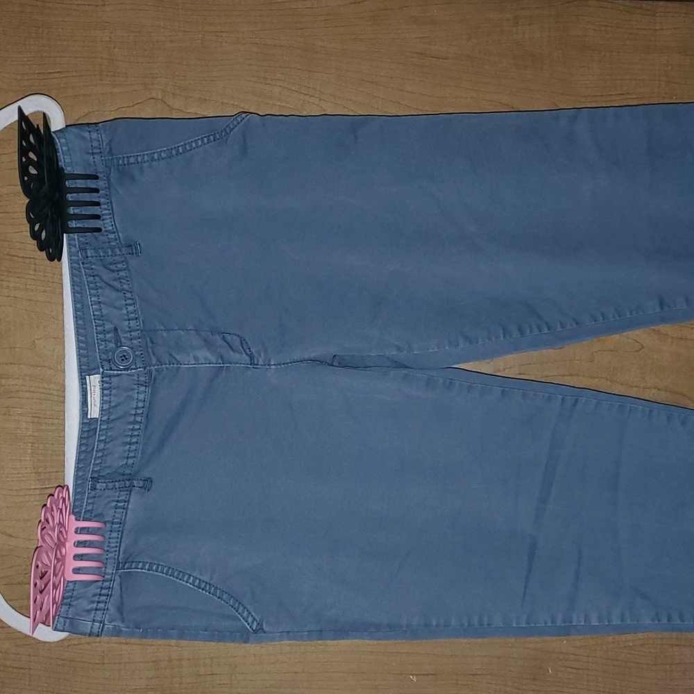 Womens Mossimo size 7 but can fit a size 6 and they are blue in color.